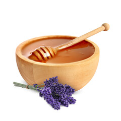 Honey in wooden bowl, dipper and lavender flowers isolated on white