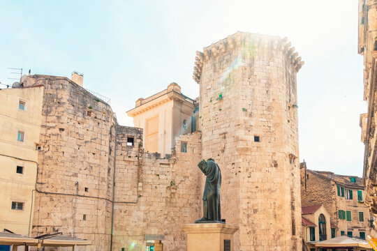 Croatia, Split-Dalmatia County, Split, Statue of Marko Marulic in front of Venetian Tower