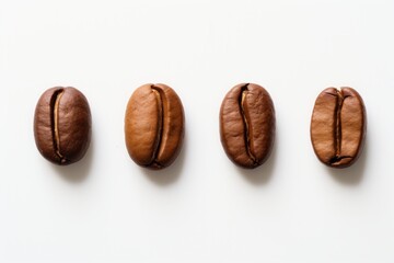 Obraz premium Top view of roasted coffee beans isolated on white background with copy space. Coffe beans with white space