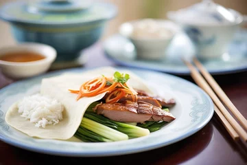 Fototapeten peking duck with steamed rice © studioworkstock