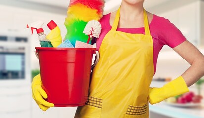 portrait  woman hold cleaning bucket for housekeeping