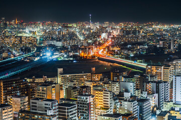 川崎のマンション群と東京の都市夜景【神奈川県・川崎市】　
Illuminated night view of Tokyo and Kawasaki city - Japan