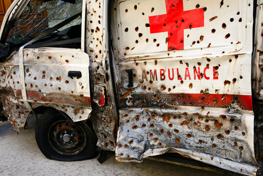 Geneva, Switzerland, Europe - Red Cross ambulance vehicle crashed, full of bullet holes, exhibit in Red Cross Museum, Headquarters International Committee of the Red Cross