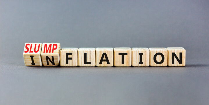 Inflation or slumpflation symbol. Concept word Inflation Slumpflation on beautiful wooden cubes. Beautiful grey table grey background. Business inflation slumpflation concept. Copy space. - Powered by Adobe