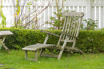 Vintage weathered wooden garden recliner seat