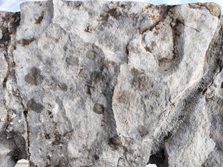 Natural texture of stones. Background of large block of stone. irregularities and patterns on the...