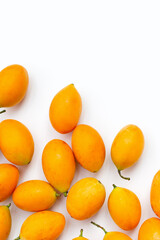 Marian plum fruit isolated on white.