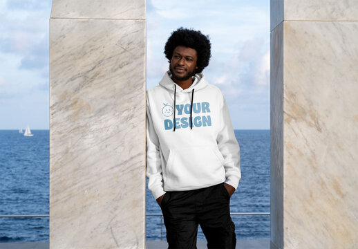 Mockup of man wearing customizable hoodie by pillar