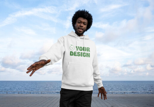 Mockup of man wearing customized hoodie, gesturing