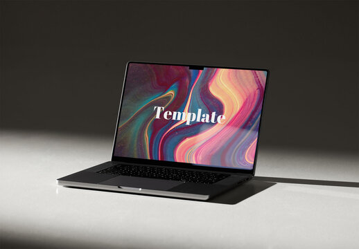 Mockup of open laptop with customizable screen