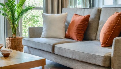 close up of fabric sofa with white and terra cotta pillows french country home interior design of modern living room - obrazy, fototapety, plakaty