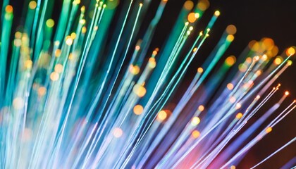 a close up macro image of multicolored vibrantly glowing optical fiber abstract background