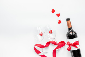 Valentines Day background with red wine and two glasses