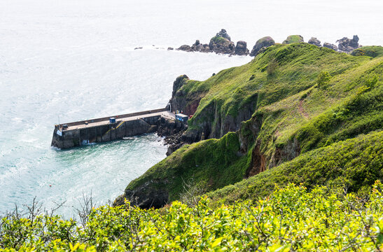 View towards Maseline Harbour, main commercial harbour on the Isle of Sark, Channel Islands