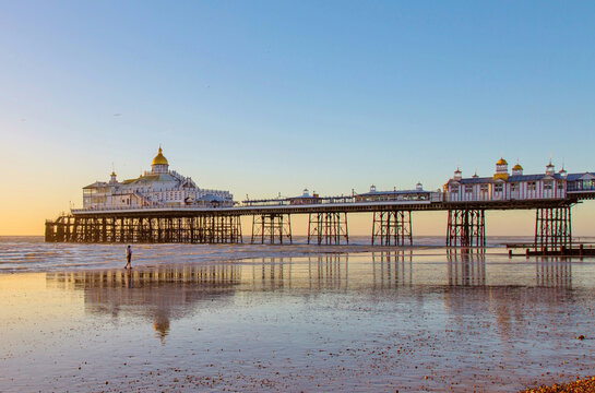 Eastbourne Pier at sunrise, constructed in the 1870s and a Grade II* listed structure, Eastbourne, East Sussex, England