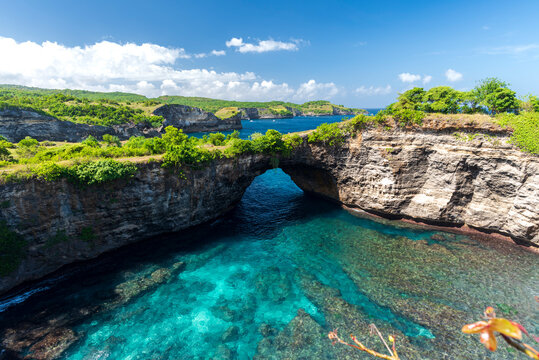 Elevated view of the tropical bay and the natural arch at the so called Broken beach, Nusa Penida, Klungkung regency, Bali, Indonesia, Southeast Asia