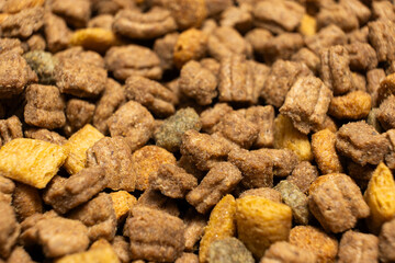 Dry food for kittens and cats close-up. A complete cat diet