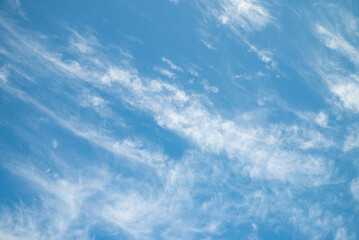 Blue sky background with beautiful white cloud in sunny day summer season. Nature and save environmental concept.