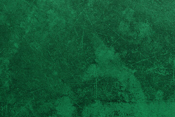 Dark green grungy background or texture