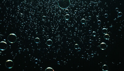 Bubbles floating in the water with dark background - obrazy, fototapety, plakaty