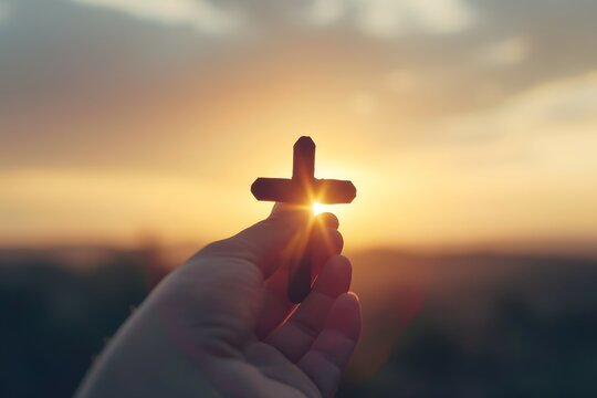 A wooden cross held against a blue sky symbolizing faith and reflection for Good Friday - Powered by Adobe