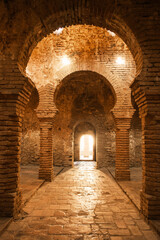Fototapeta premium Interior of Arab Baths (Banos Arabes), Ronda, Andalucia, Spain. It is a unique archeological site showcasing a 13th-century bathhouse that was built during the Islamic period in Ronda.