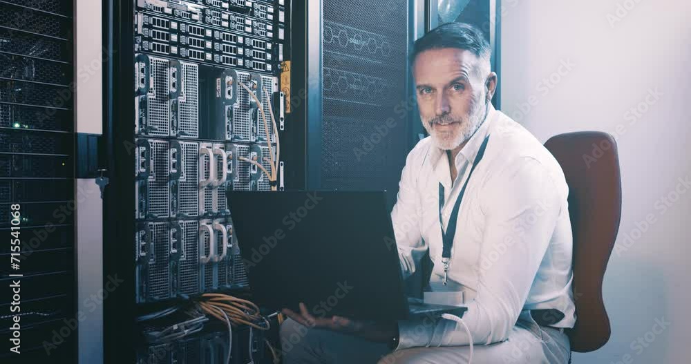 Leinwandbilder Face of mature man in server room with laptop, network maintenance and engineer in digital storage for database update. Tech, system administration and technician online in data center with computer.