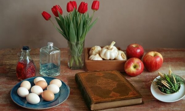Norooz Celebration Table with Traditional Haft-Sin Symbols