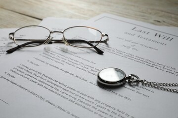 Last Will and Testament, glasses and pocket watch on white table, closeup