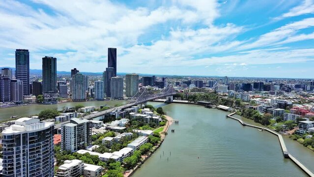 Brisbane, Australia: Aerial view of Story Bridge  in capital city of Australian state of Queensland, skyscraper skyline of Brisbane central business district (CBD) on horizon
