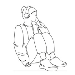 girl listening to music on headphones