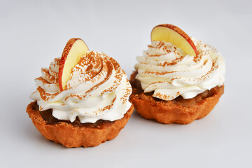 Sweet food cake tartlet with whipped cream