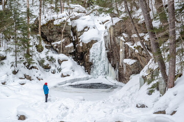 Hiker in Franconia Notch State Park . New Hampshire mountains. USA