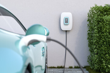 Charging an electric vehicle at home with a home charging station (wallbox). Focus on the wallbox displaying status information. Selective focus. - obrazy, fototapety, plakaty