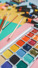 Back to school. Panoramic education banner. Top view, flat lay. Colorful supplies on table, colored paper. Children's creativity concept. Preschool study, development. Accessories for the schoolroom