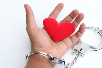 red heart and shackle, The concept of love and commitment