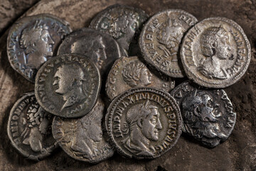 A treasure of Roman gold and silver coins.Trajan Decius. AD 249-251. AV Aureus.Ancient coin of the...