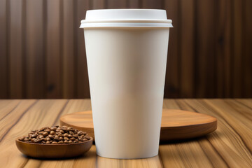 Closeup of a white paper cup of coffee and croissant on a table in an empty cafe without people