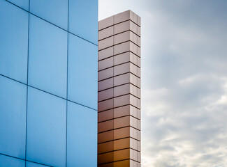 fragment of the building wall against the background of the autumn sky