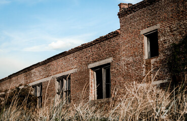 abandoned brick house in the war zone Ukraine