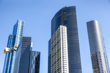 Melbourne city skyscrapers in the Southbank district, against a clear blue sky. © Rixie
