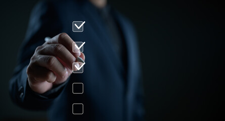 Business performance checklist, businessman using phone doing online checklist survey, filling out...