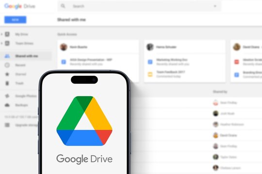 Google Drive logo displayed on modern smartphone, website of the file storage and synchronization service developed by Google in the background, cloud storage and file hosting service, share