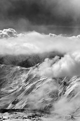Black and white view on ski resort in mist - 715614663