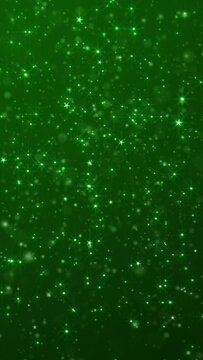 Vertical video - shiny glittering green stars and particles. Glitzy elegant celebration party animation. Suitable as an alternative abstract luxury Saint Patrick's Day background.