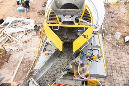 cement pouring out of a cement truck