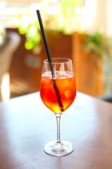 Cocktail glass on wooden table