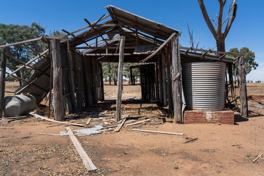 A broken down farm shed in a dry paddock at Campbells, Forest in Central Victoria.