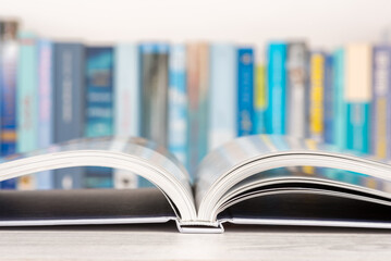 Open book on the table in library