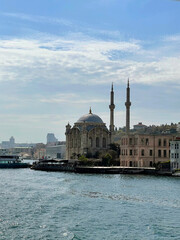 Fototapeta na wymiar 17 of April 2023 - Istanbul, Turkey: Ortakoy, Great Mecidiye Mosque, view from the sea